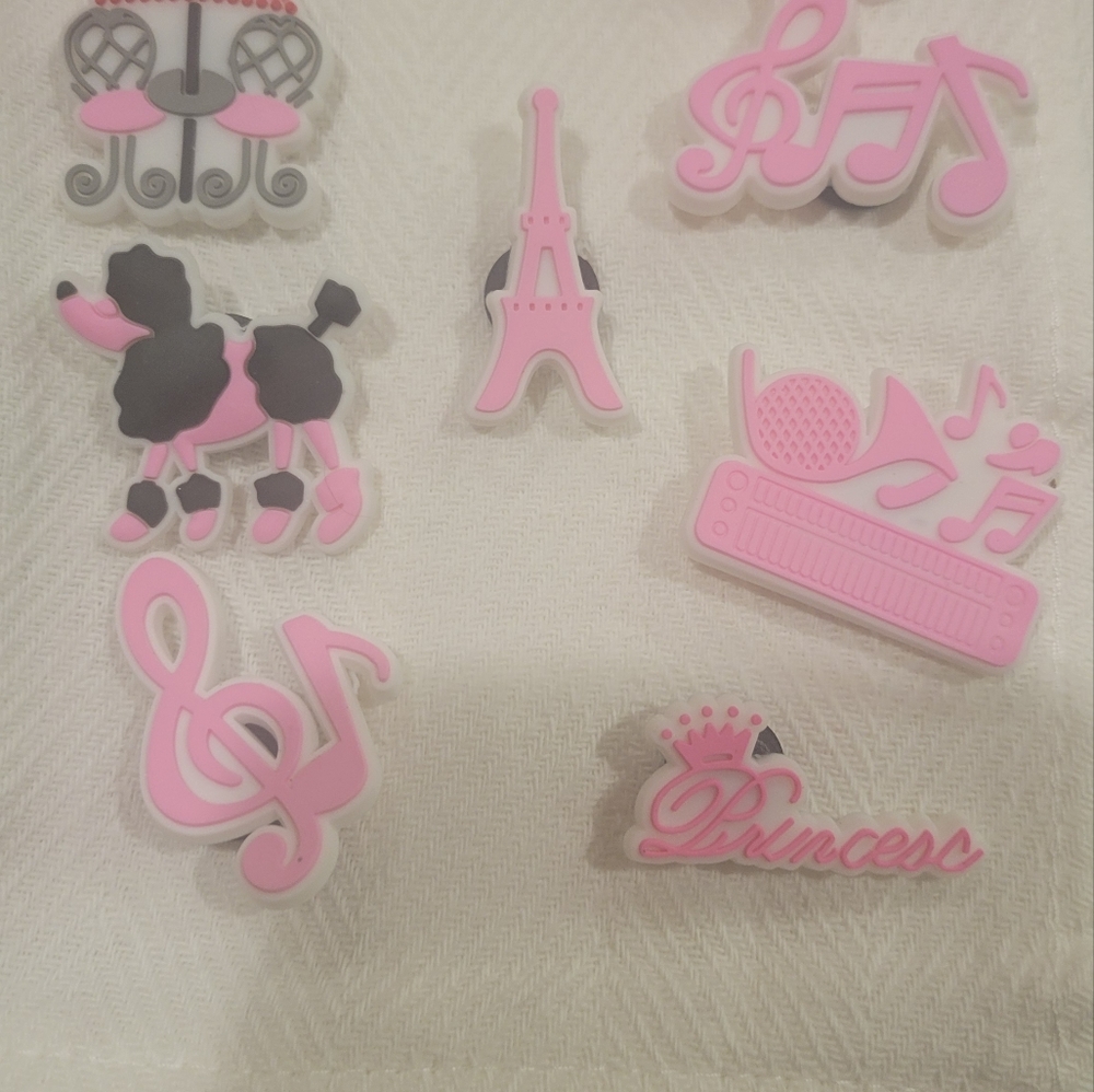 Clog, crocks, charms pink, think "Barbie"